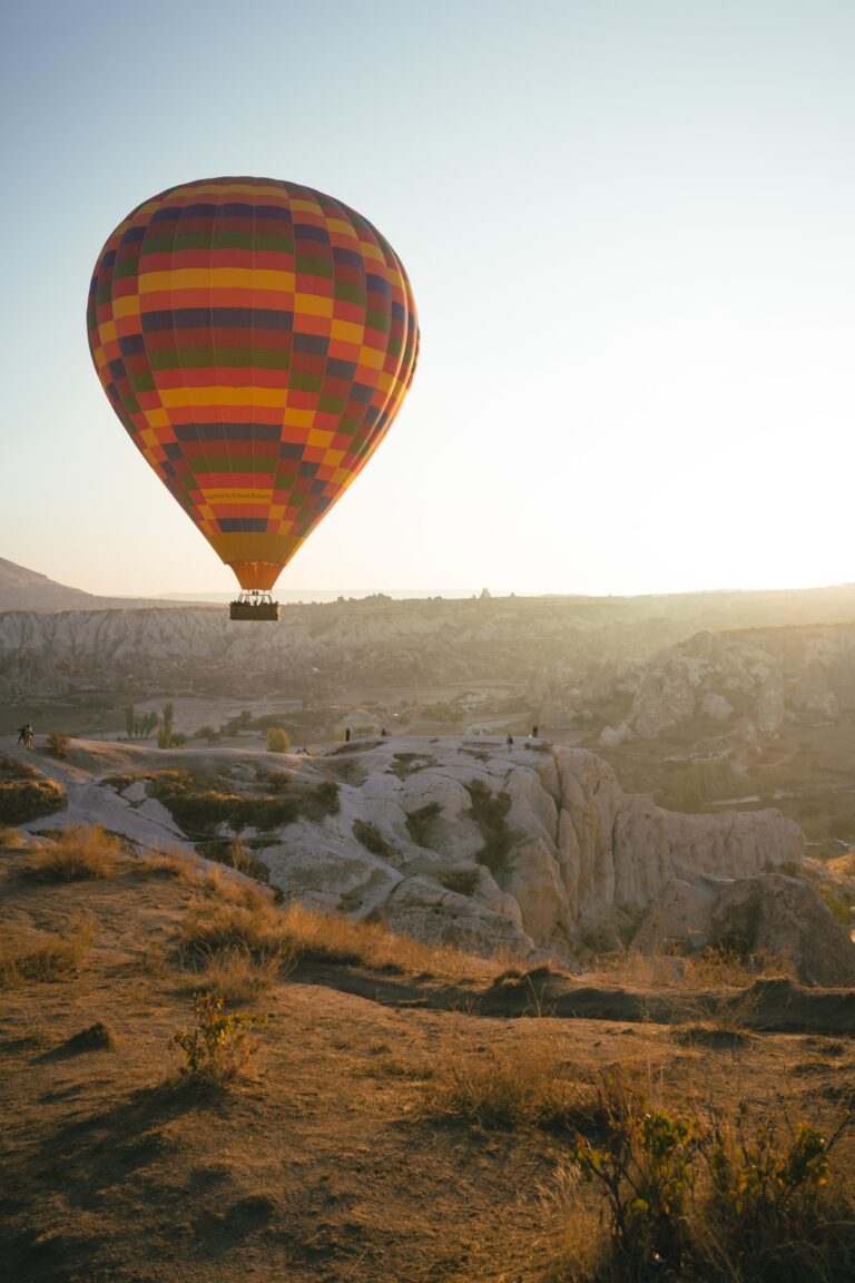 Hot air balloon flying above Cappadocia´ landscape